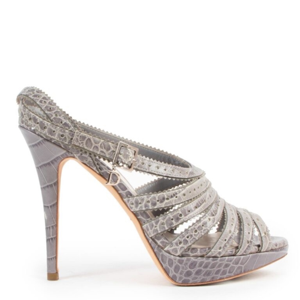 CHRISTIAN DIOR leather animal print sling back sandals.